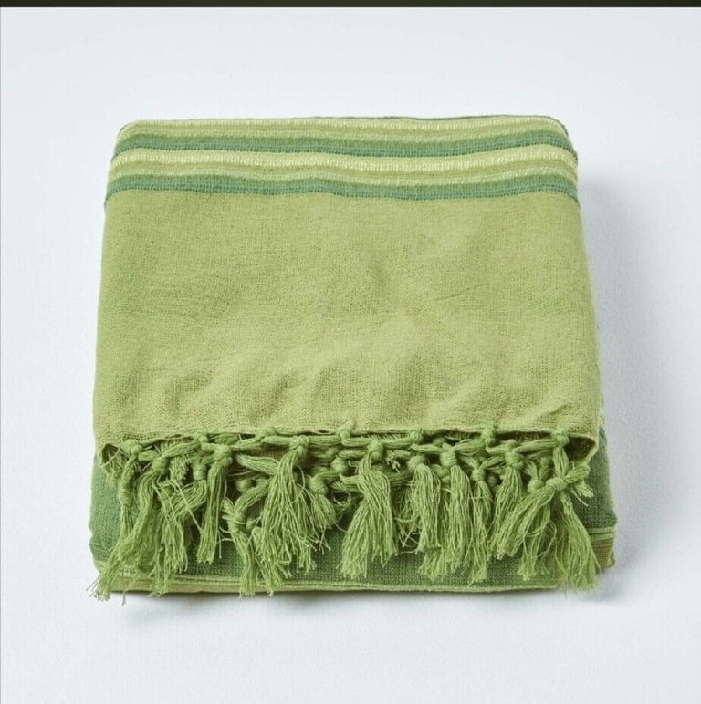 Striped green throw