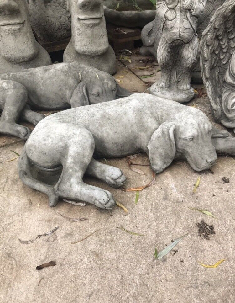Sleeping puppy garden statue