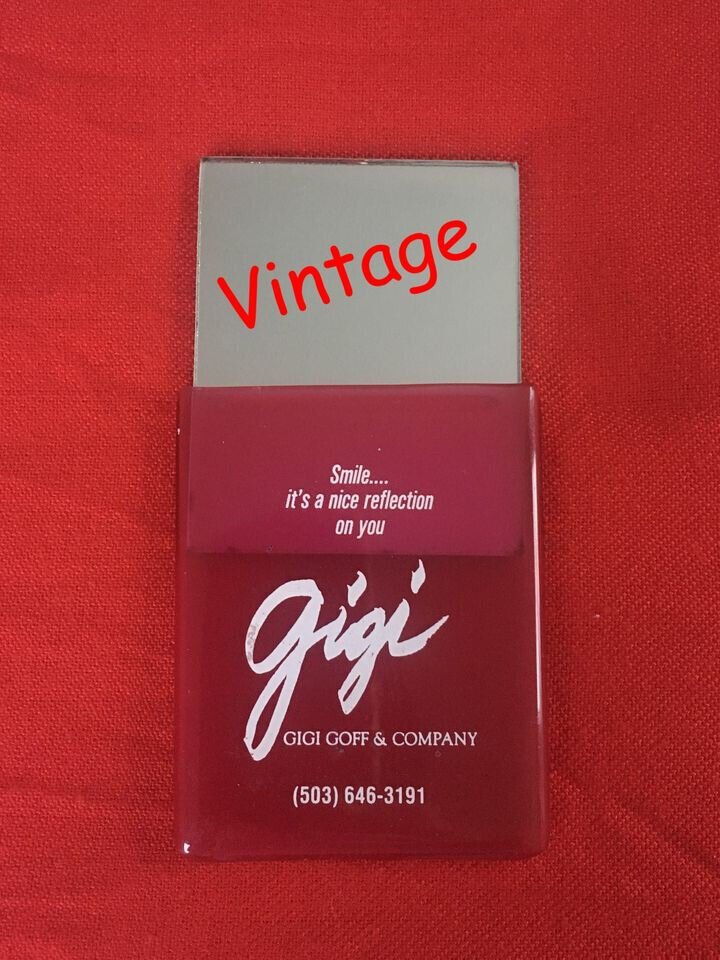 image for 	Vintage 1970's American advertising/promotional handbag-size 'Gigi' mirror in holder. From USA