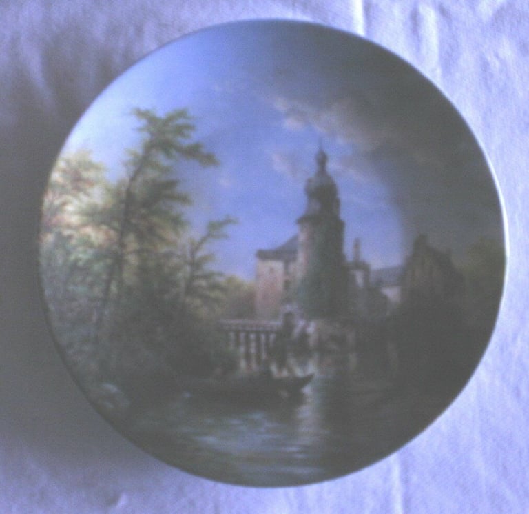 Moated castles by Eleonore  Guinther. Collectors Plates with the artist signature on the plate