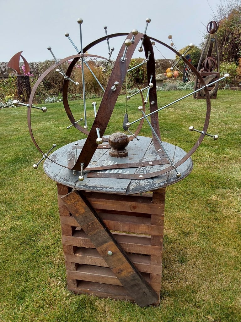 Garden art from whisky barrel materials 