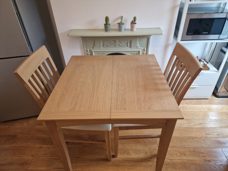 Extending dining table and two chairs £40 | in Lewisham, London | Gumtree