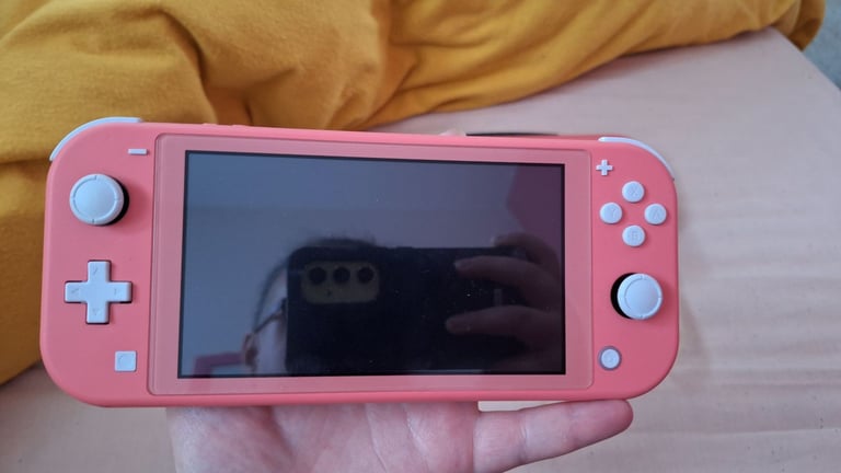 Nintendo switch lite coral pink 
