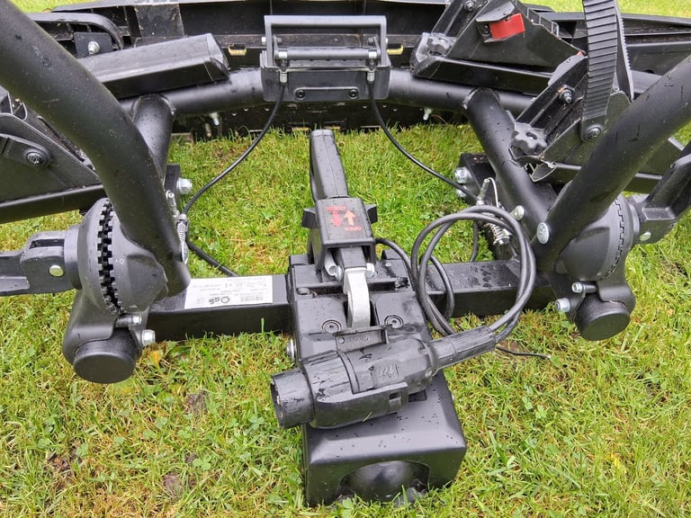 Menabo towbar mounted bike rack. Quality built to hold any bike in particular heavier E-Bikes