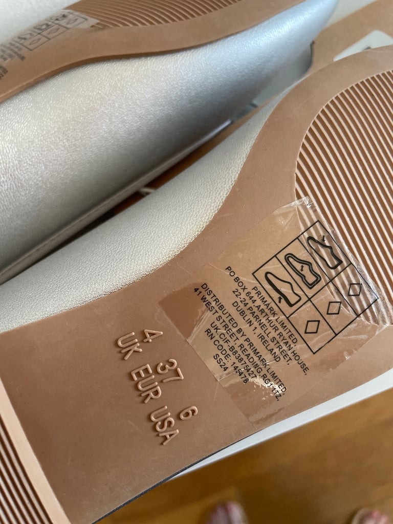 Silver Pumps.  Size 4