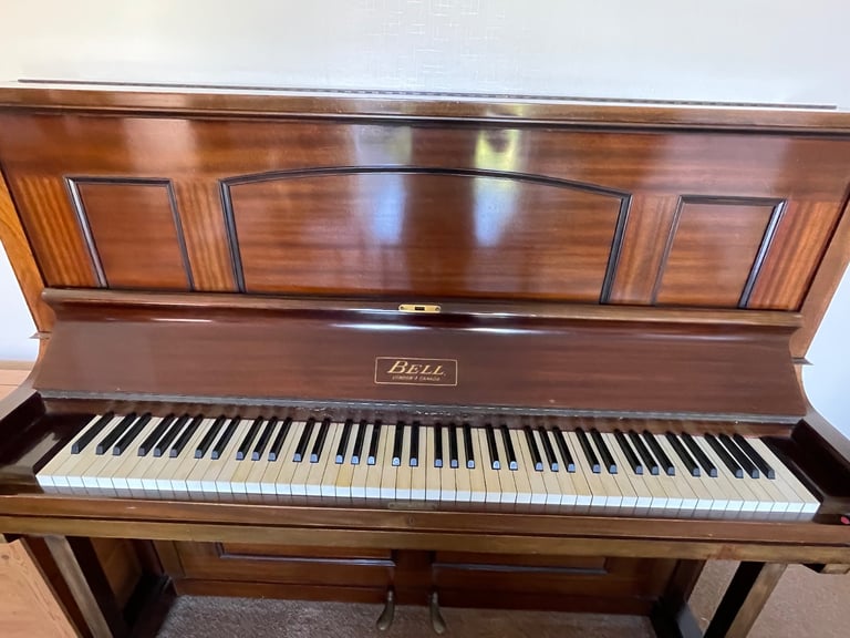 UPRIGHT OVERSTRUNG MAHOGANY PIANO WITH JOHN AUSTIN STOOL