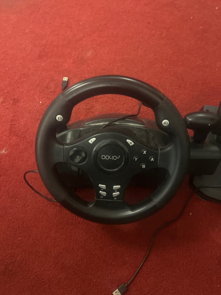 Racing steering wheel and peddles