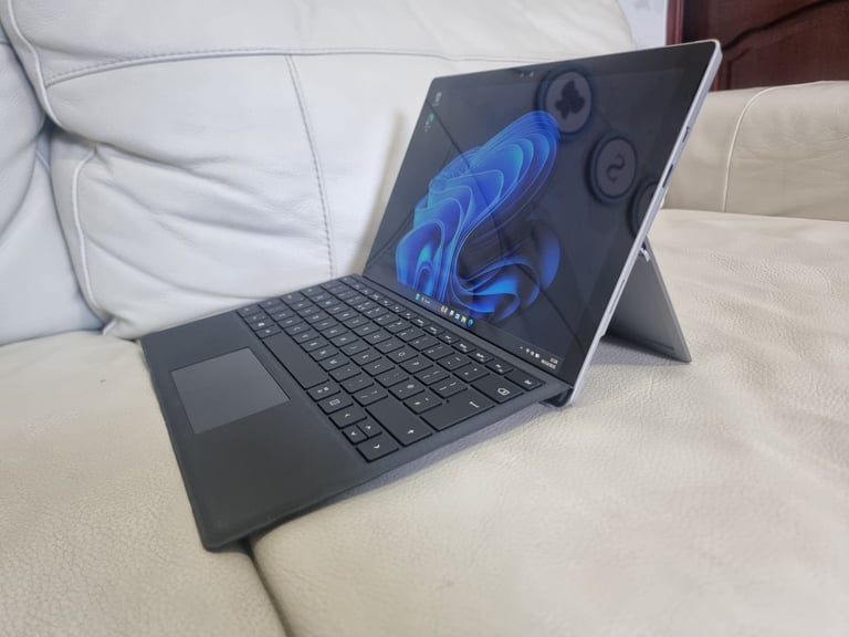 Microsoft Surface Pro 4. i7 6650U, 8GB RAM, 256GB NVME.
