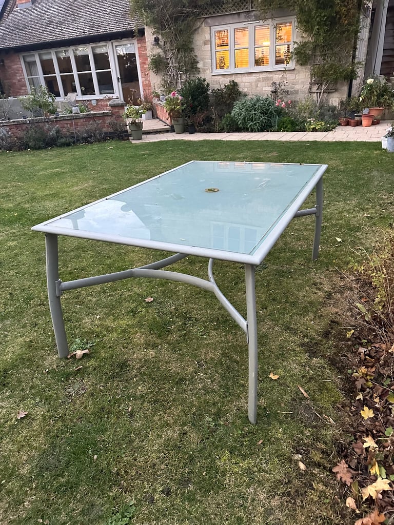 image for Garden table and 6 matching chairs