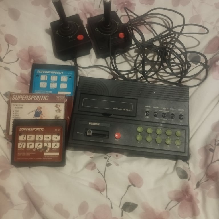 image for Vintage game console , controls and games