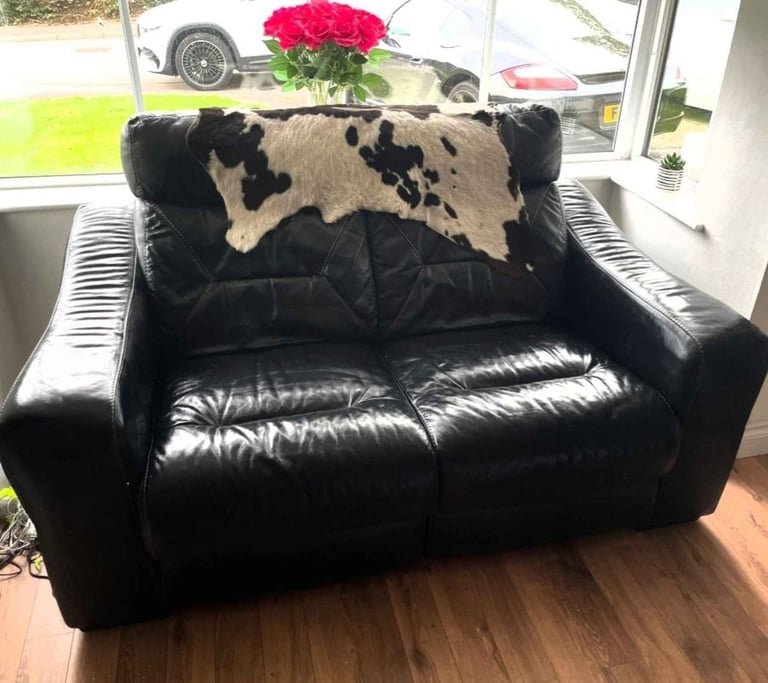 image for 2 black recliner leather sofas for sale