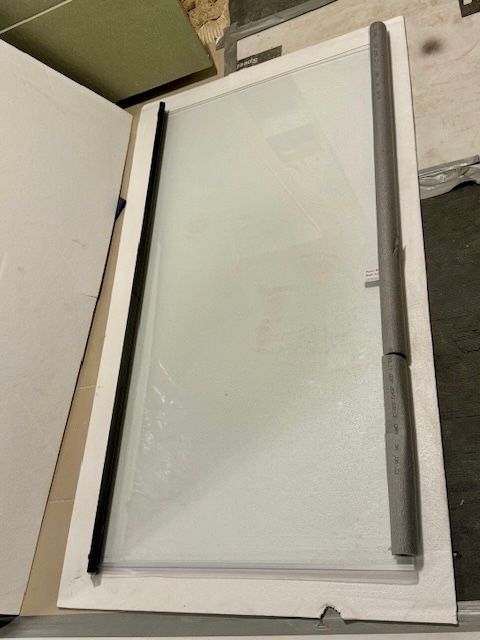 image for Black over bath frameless shower screen