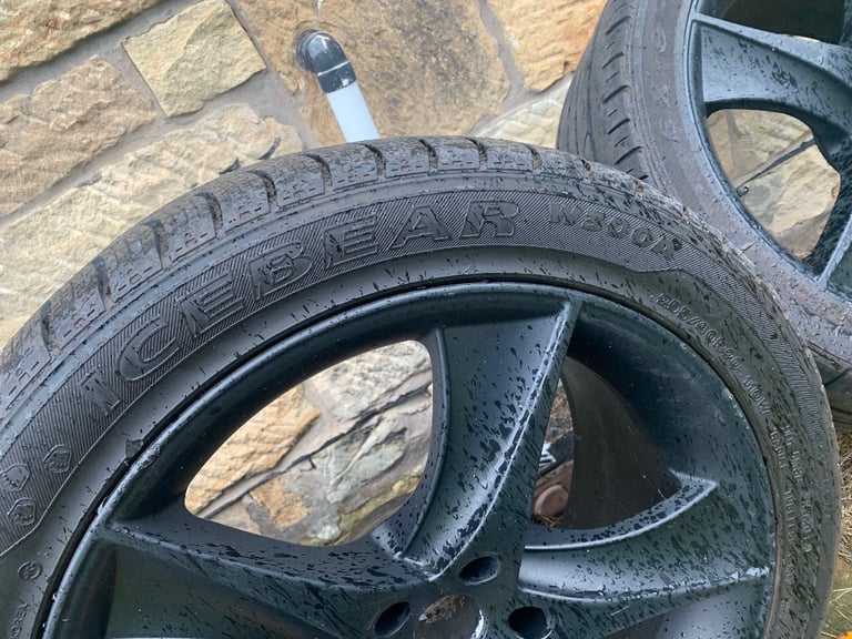 4 Black alloys with winter tyres for BMW X6 or similar