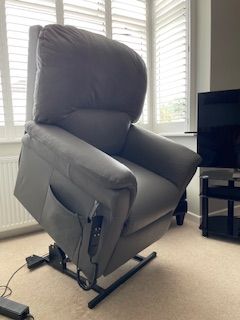 Dual motor rise and recline armchair.