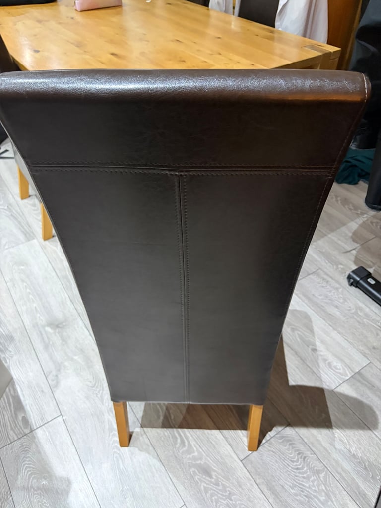Brown faux leather chairs 