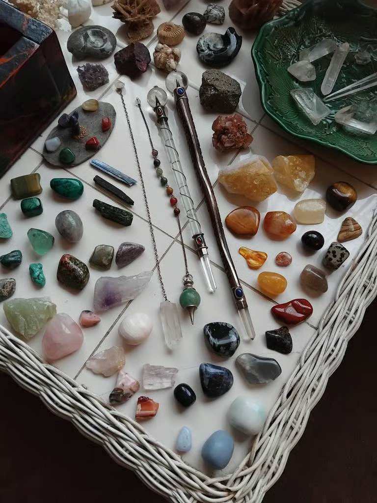 A Large Amount of Crystals, Some Natural, and Tumblestones, 2 Crystal Wands, and 2 Crystal Pendulums