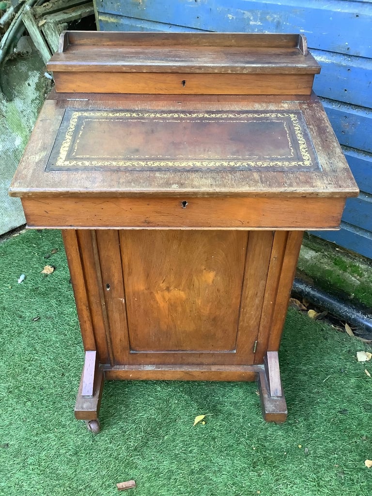 Victorian walnut brown leather insert davenport with ink wells & wheel castors