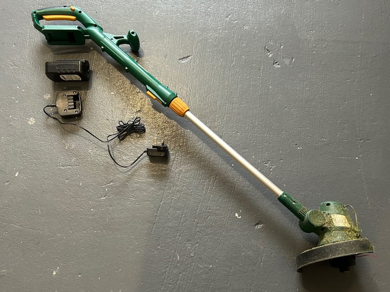 Cordless electric garden strimmer, and charger excellent working condition £15