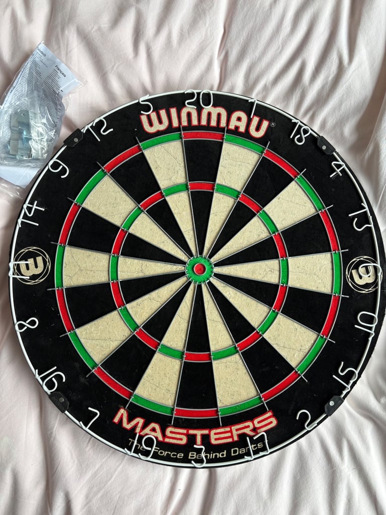 image for Winmau Darts Board - brand new with darts 