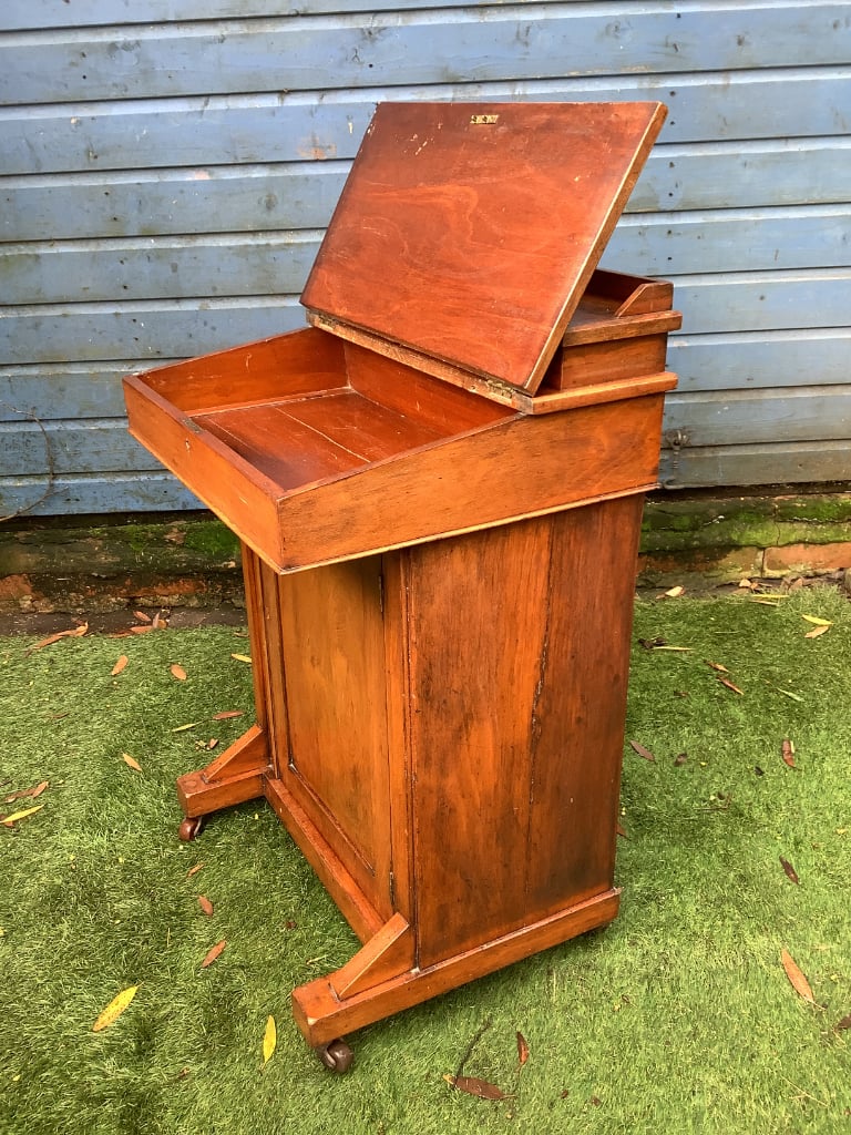 Victorian walnut brown leather insert davenport with ink wells & wheel castors