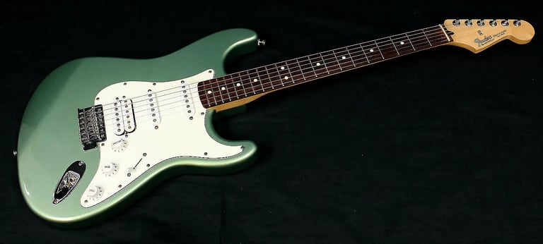 image for Mexican Fat Strat, Guitar bag, Guitar strap, Guitar stand, Guitar Tuner. 