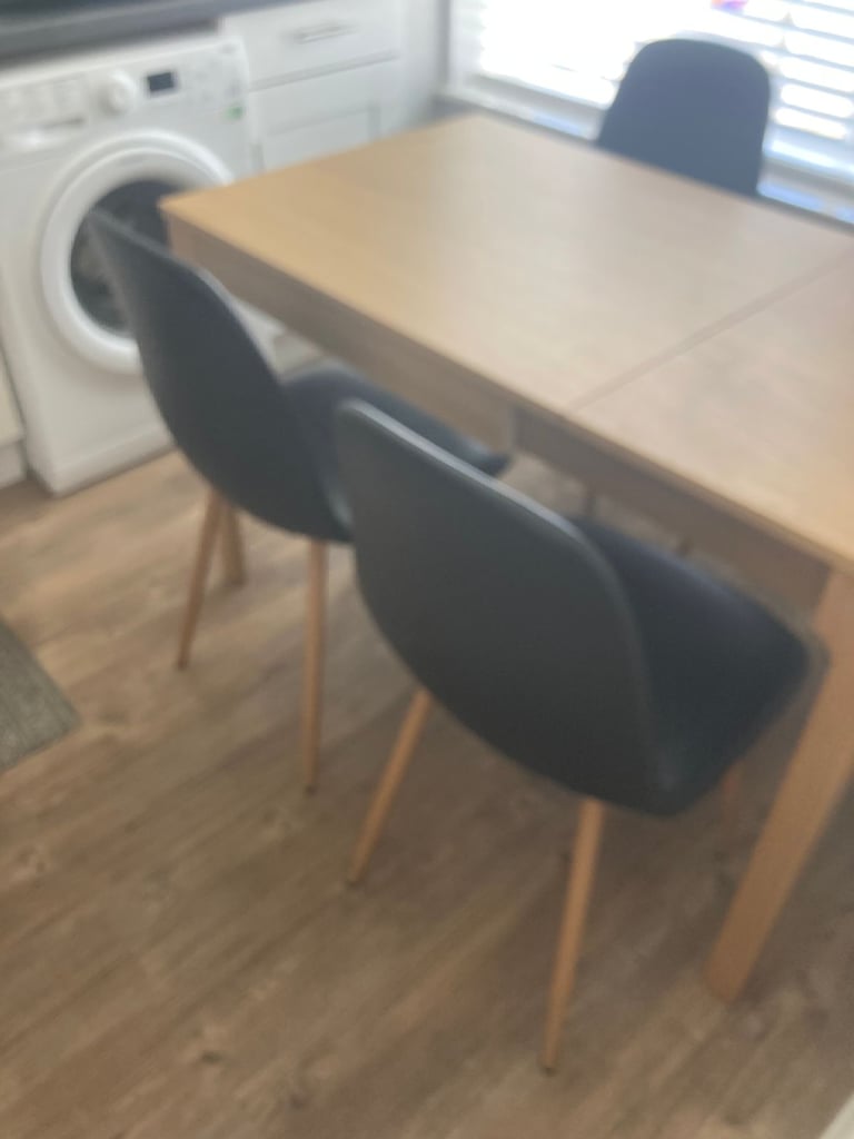 dining table and four chairs