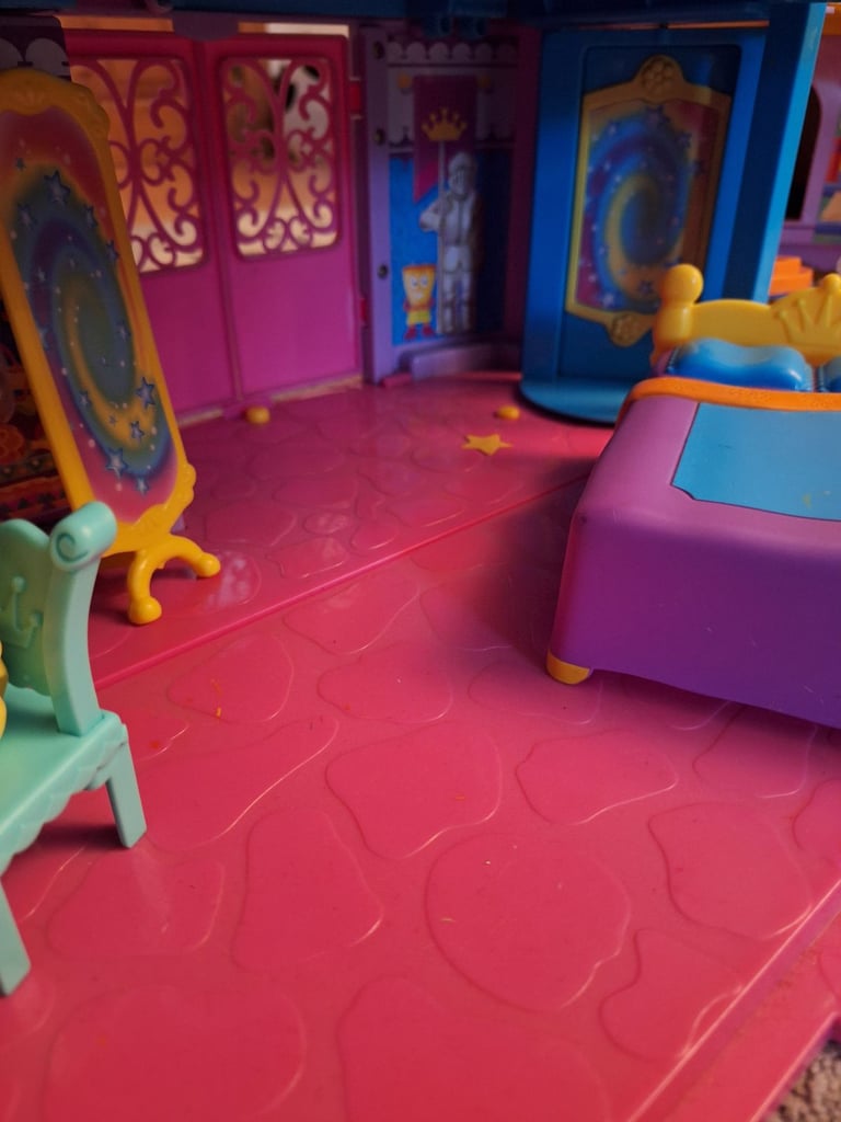 Kids play castle with furniture & people 