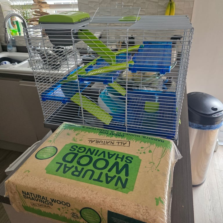 Large hamster cage with new wood chippings