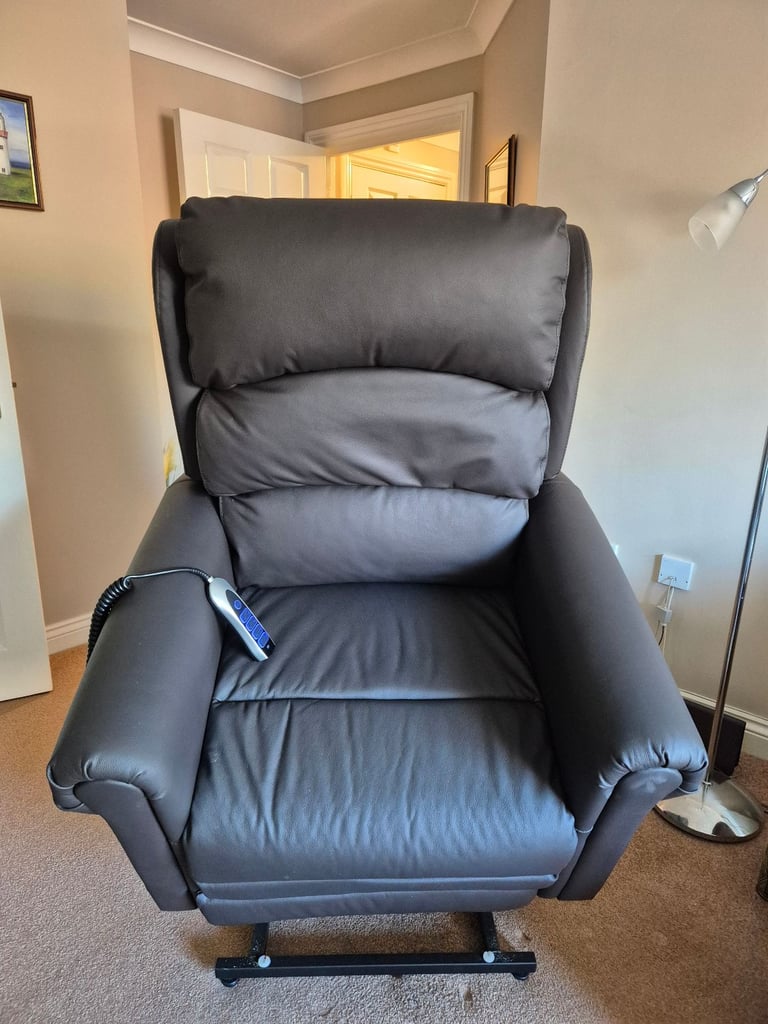 Careco electric riser/recliner brown leather chair 