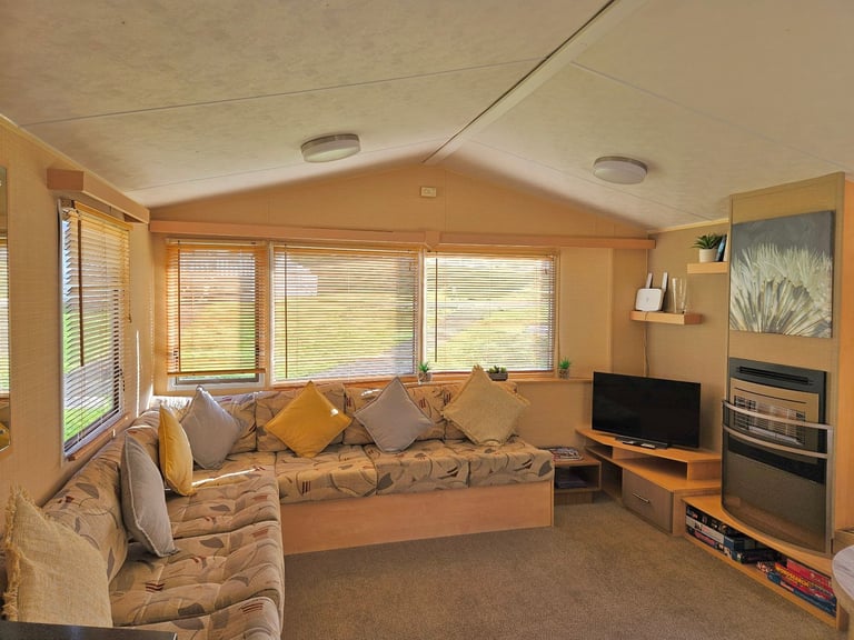 Cheap static caravan for sale at Whitecliff Bay, Isle of Wight PO35 5PL Beach access