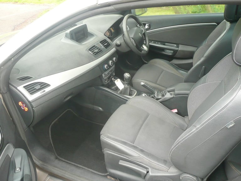 2012, 1.9 diesel Renault Megane convertible.