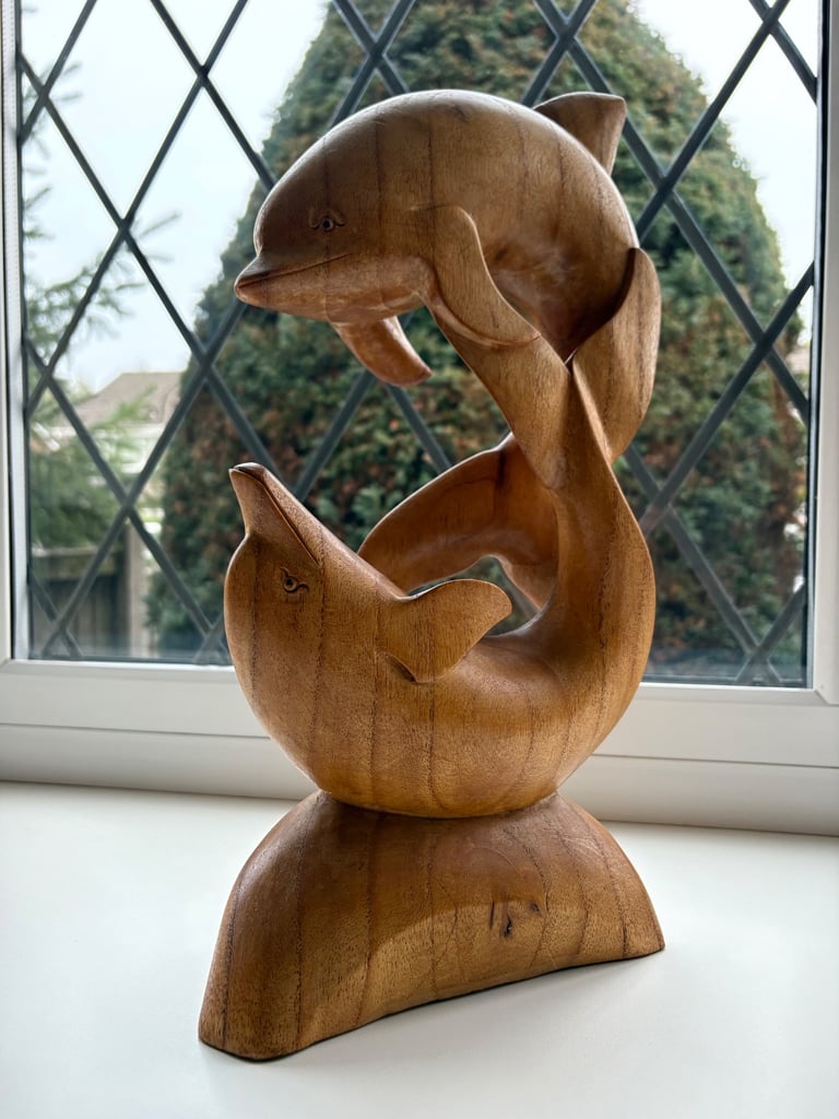 image for Hand-Carved Wooden Dolphin Sculpture