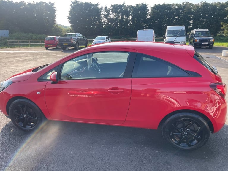 VAUXHALL CORSA 1.4 GRIFFIN with full main dealer service history, bright red,