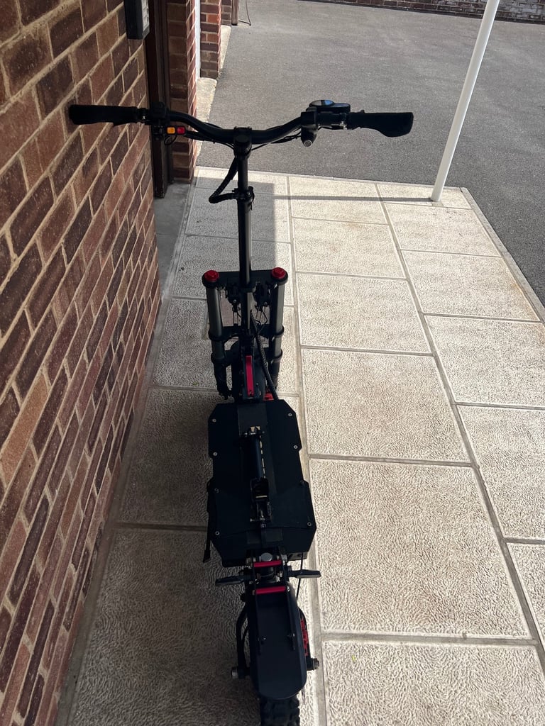 Wolf H9 Atv all terrain military grade 5200 watt e scooter 2 wheel drive 62 volt 60 mph