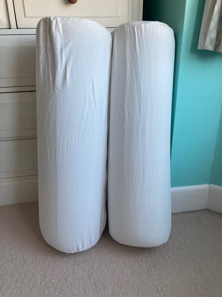 2 foam boulster cushions