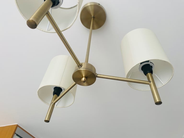 Pendant light with brass touch