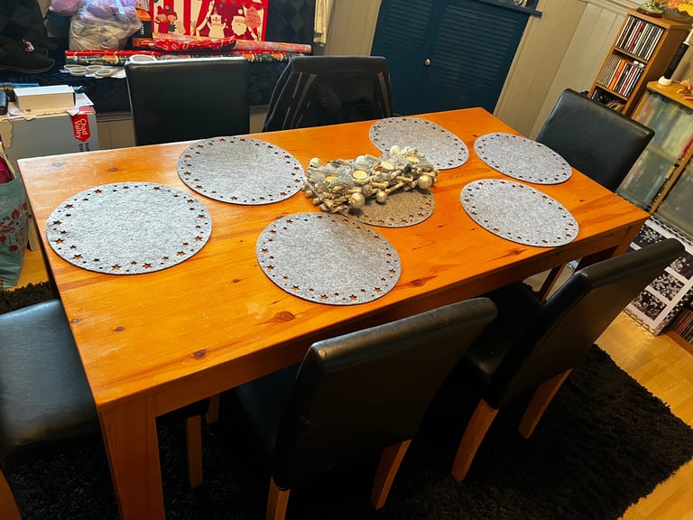 Dining table with 6 faux leather chairs