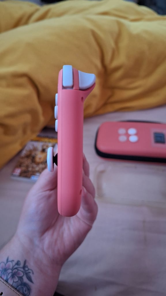 Nintendo switch lite coral pink 