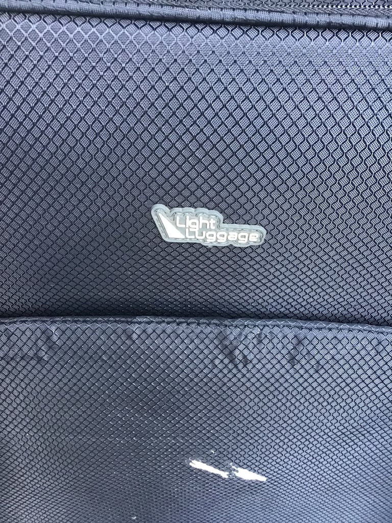 Used Lightweight large suitcase 28” long 18”wide 10”depth  Good for Storage or holidays