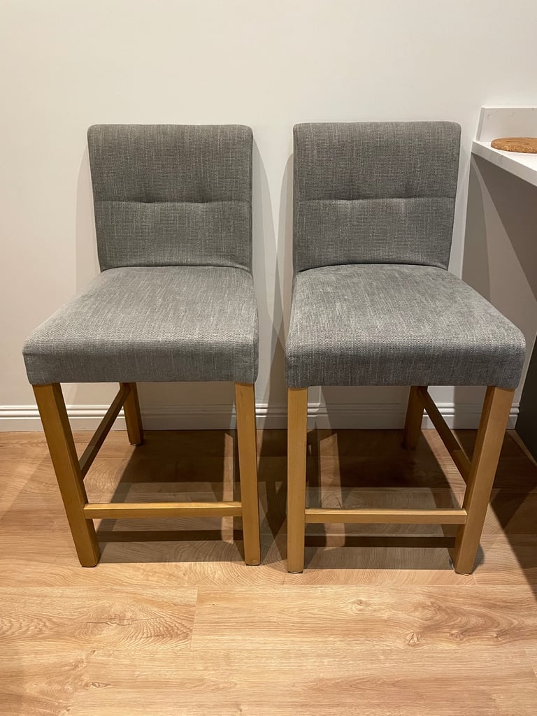 Two wooden & grey bar stools