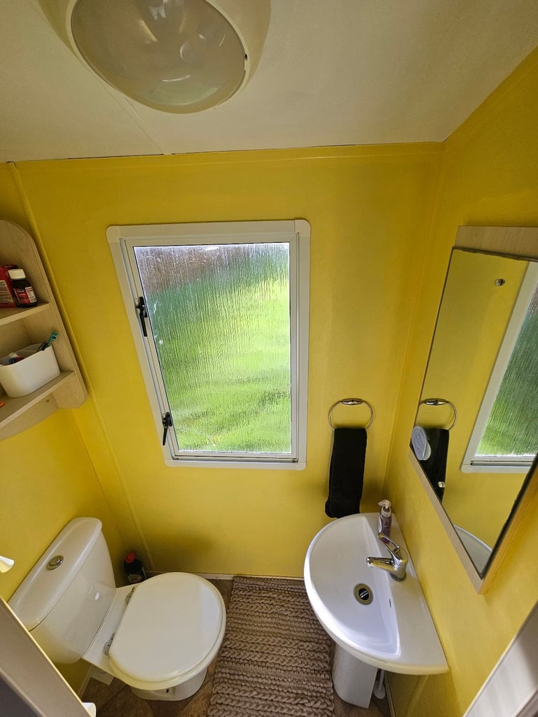 Static caravan with timber structure