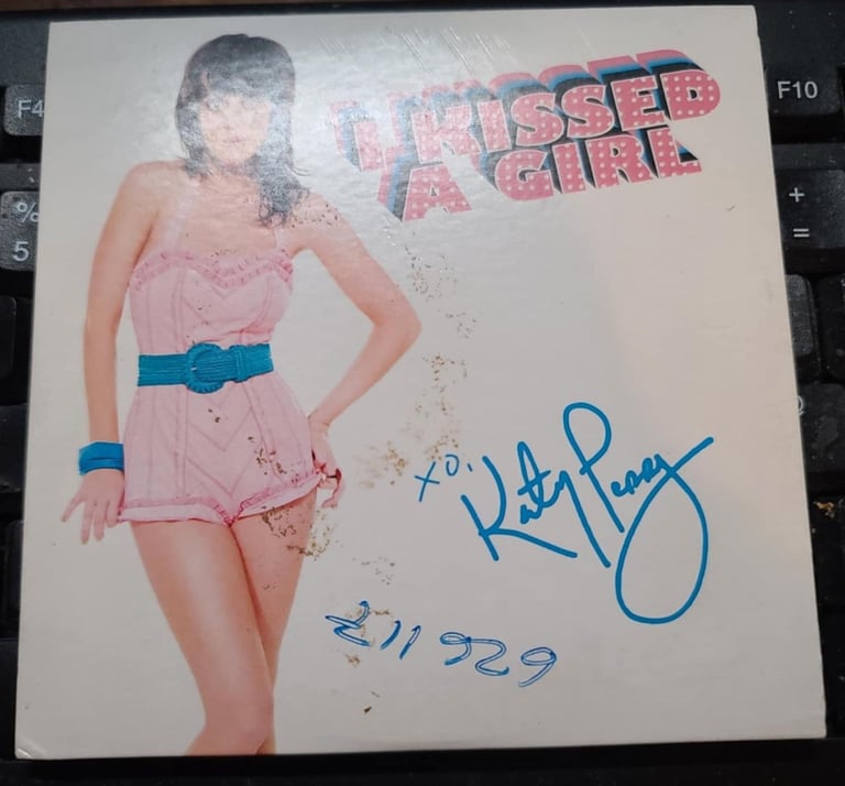 image for KATY PERRY CD SINGLE I KISSED A GIRL SIGNED A RARE CD IN A SLIP CASE SLEEVE