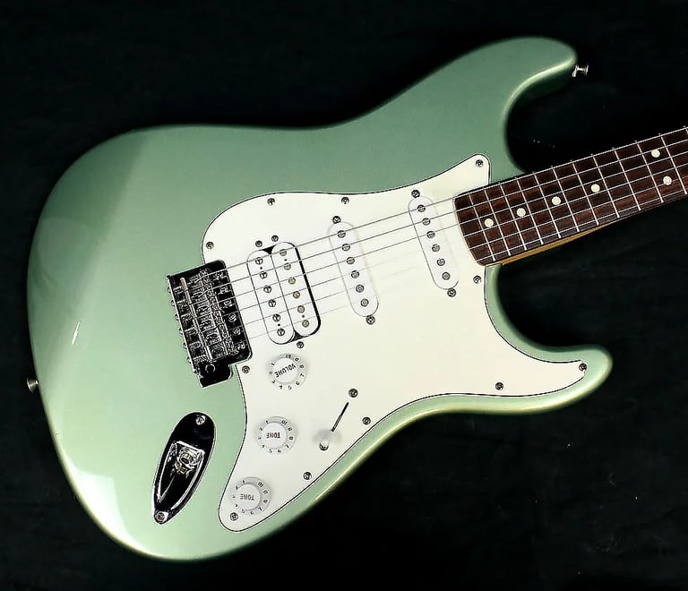 Mexican Fat Strat, Guitar bag, Guitar strap, Guitar stand, Guitar Tuner. 