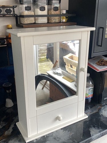 Bathroom cabinet with mirror and drawer