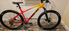 TREK Marlin 7 Gen 2 Hardtail Mountain Bike in Marigold to Radioactive 