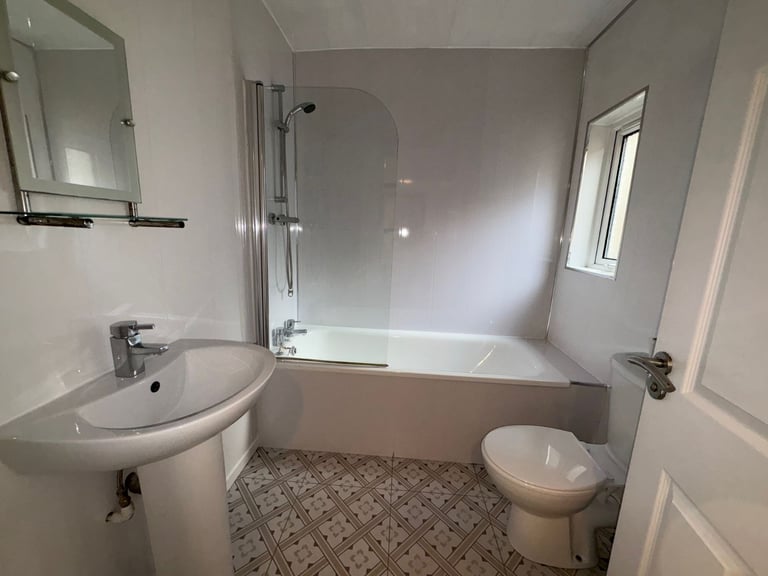 Newly Decorated Mid Terrace with Two Bedrooms and additional Home Office/Wardrobe Room