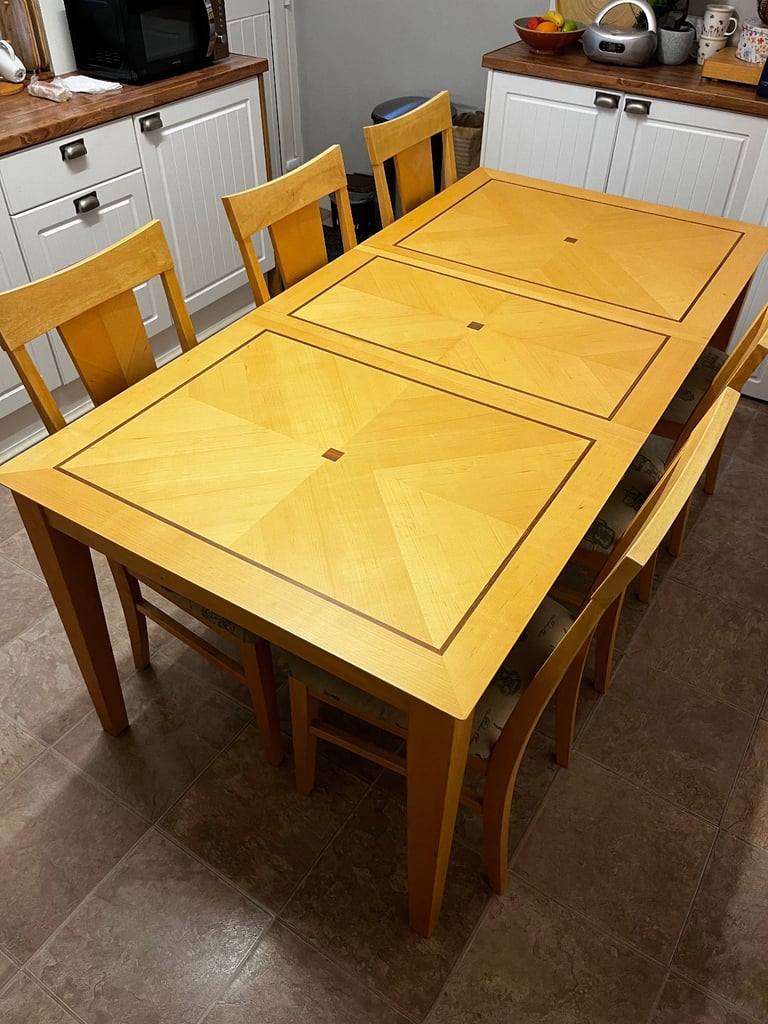 image for Wooden extending dining table and 6 chairs