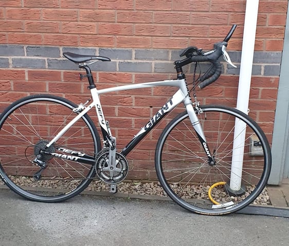 Giant defy cheap 4 road bike