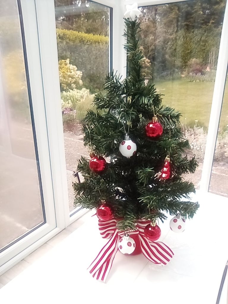 As new small Christmas tree with hanging baubles etc included.