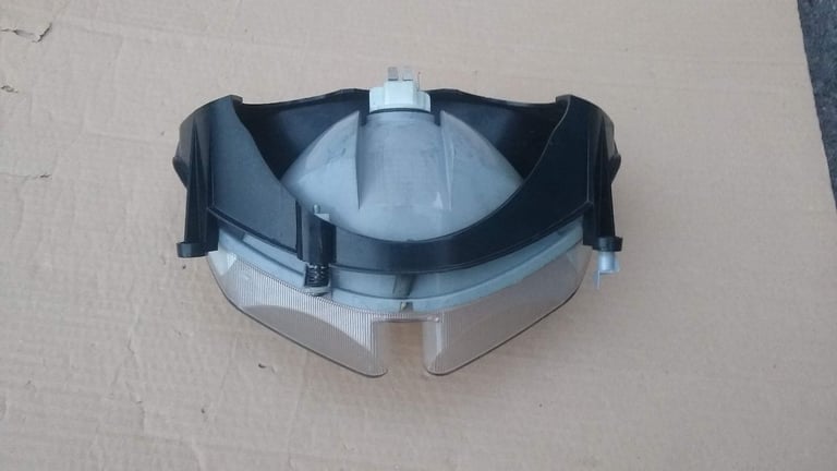 PGO T-Rex moped scooter headlight, new condition.